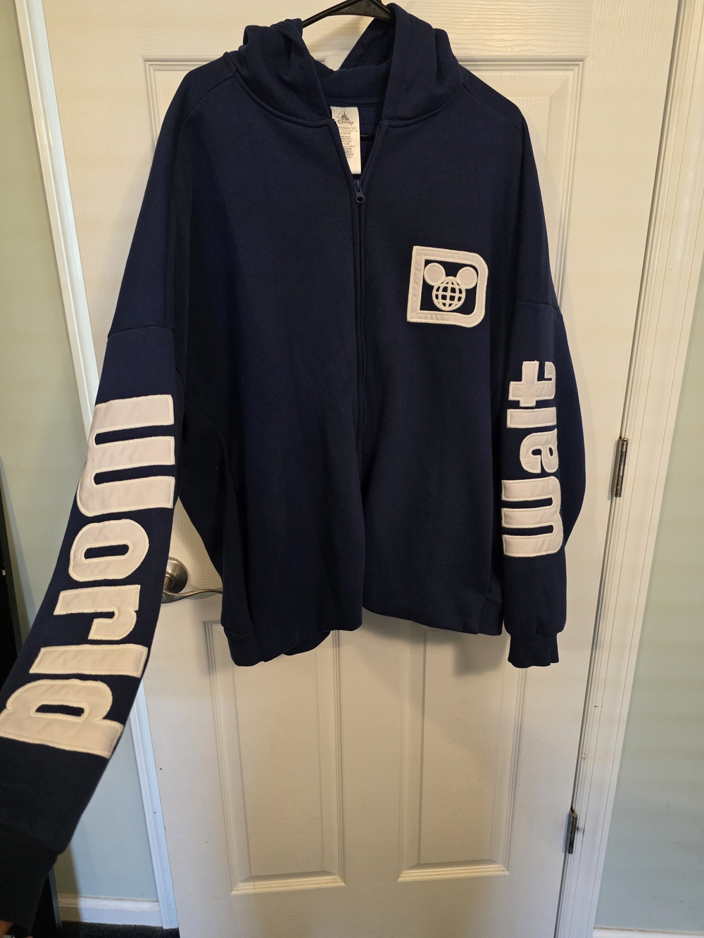 Disney Dark Blue Zip-Up Hoodie with White Tag Detail